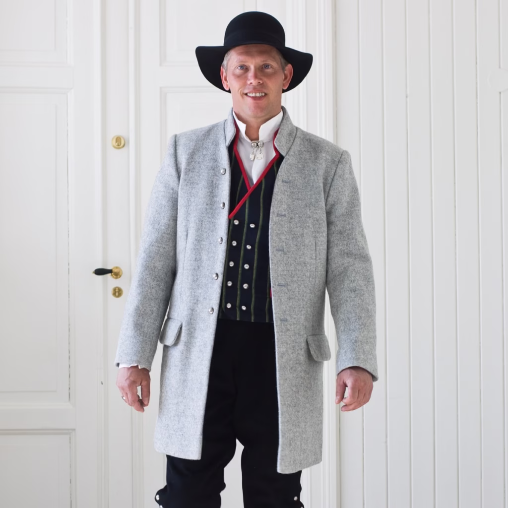 mann med askerbunad